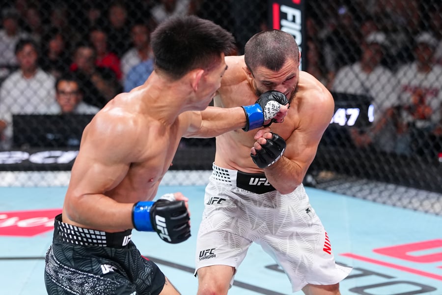 Song Yadong celebrates after knocking out Umar Nurmagomedov in the second round at UFC Shanghai 2026