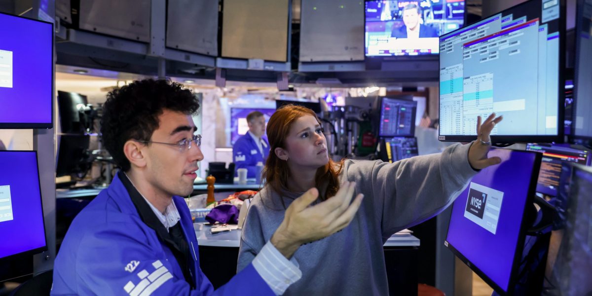 S&P 500 today: traders at work on the floor of the New York Stock Exchange as sector rotation drives the index