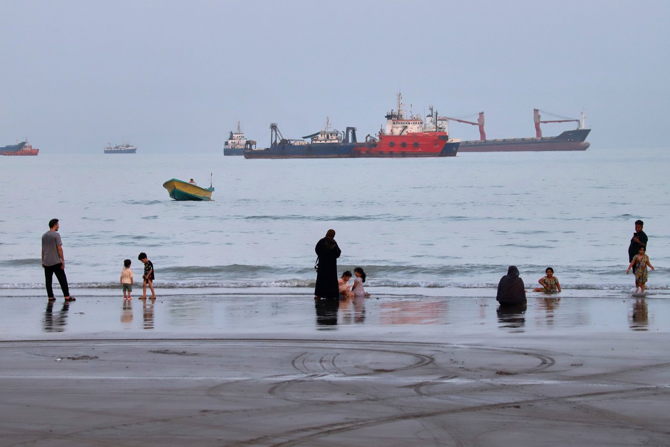 Commercial vessels anchored in the Strait of Hormuz off Bandar Abbas Iran August 2026