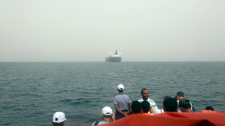 Oil tanker disabled off Oman coast after being struck by unknown projectile August 2026