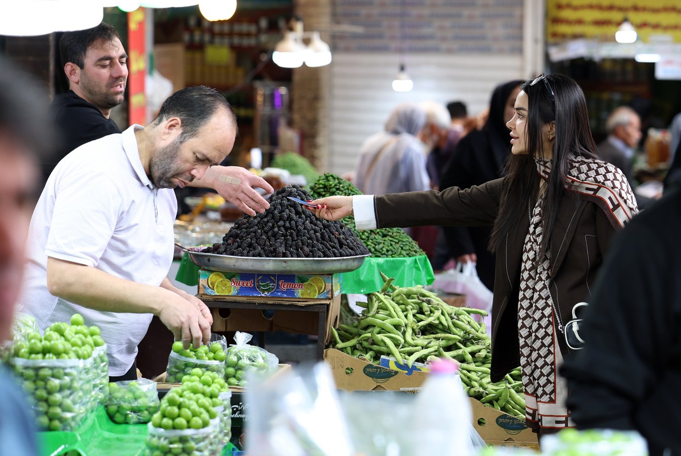 Shoppers at Tehran Tajrish bazaar amid US naval blockade and sanctions on Iran