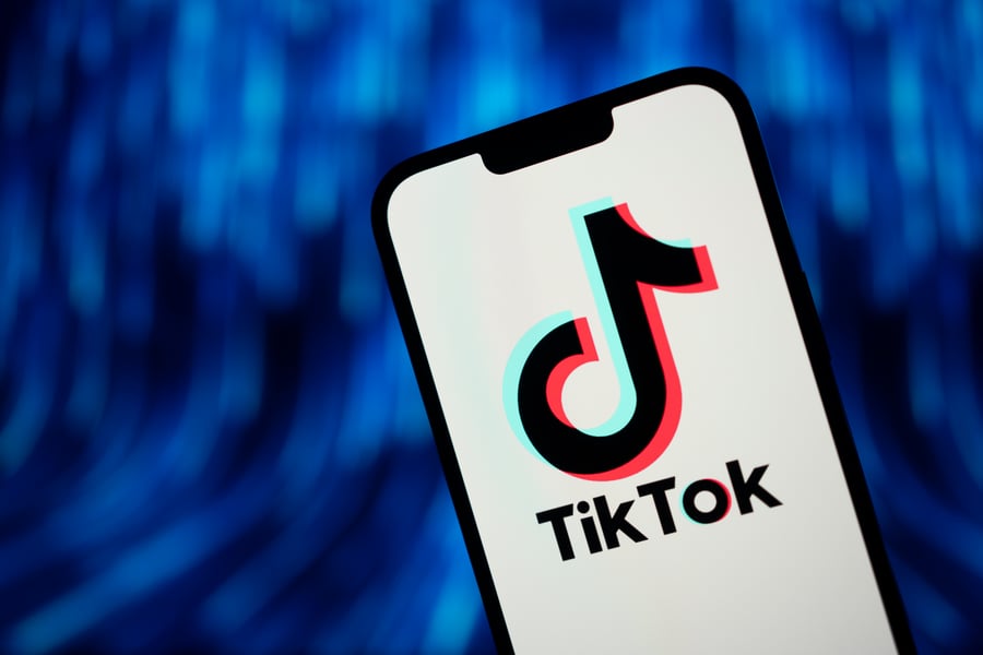 TikTok logo on a smartphone as White House lifts government device ban