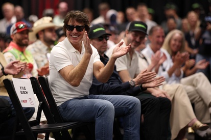 Tom Cruise addresses NASCAR drivers at Daytona International Speedway announcing Days of Thunder 2 sequel