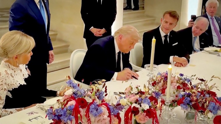 Donald Trump signs the Iran memorandum of understanding at Versailles in June 2026, the ceasefire agreement later declared void in July