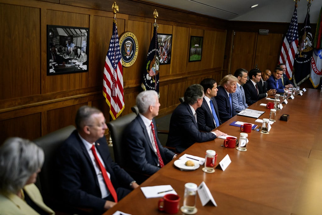 President Donald Trump meeting with Cabinet advisers at Camp David on July 31, 2026, days before the White House convened all four leading AI companies for AI safety policy talks