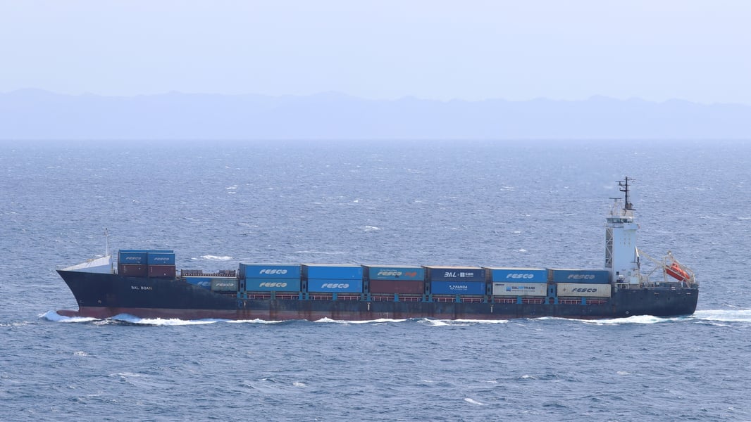 Panama-flagged containership Vela Nova disabled by US Navy Hellfire missiles in the Gulf of Oman during Iran blockade enforcement August 11 2026