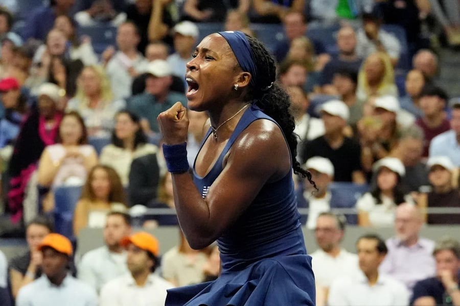 Coco Gauff in action at Arthur Ashe Stadium during her US Open 2026 title defense opener against Zeynep Sonmez