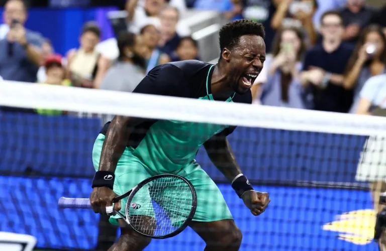 Gael Monfils jubilant after winning his US Open first-round match on his 40th birthday at Flushing Meadows