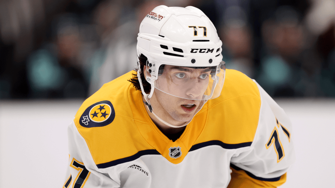 Luke Evangelista in Nashville Predators jersey after being traded to the New Jersey Devils