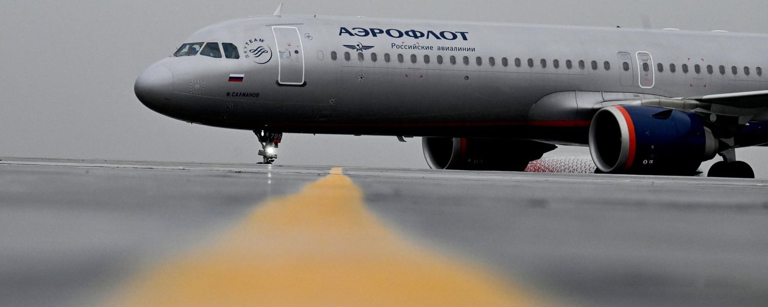 Aeroflot Russian airline aircraft on runway relevant to Putin state terrorism accusations over civilian aircraft threats in Ukraine conflict