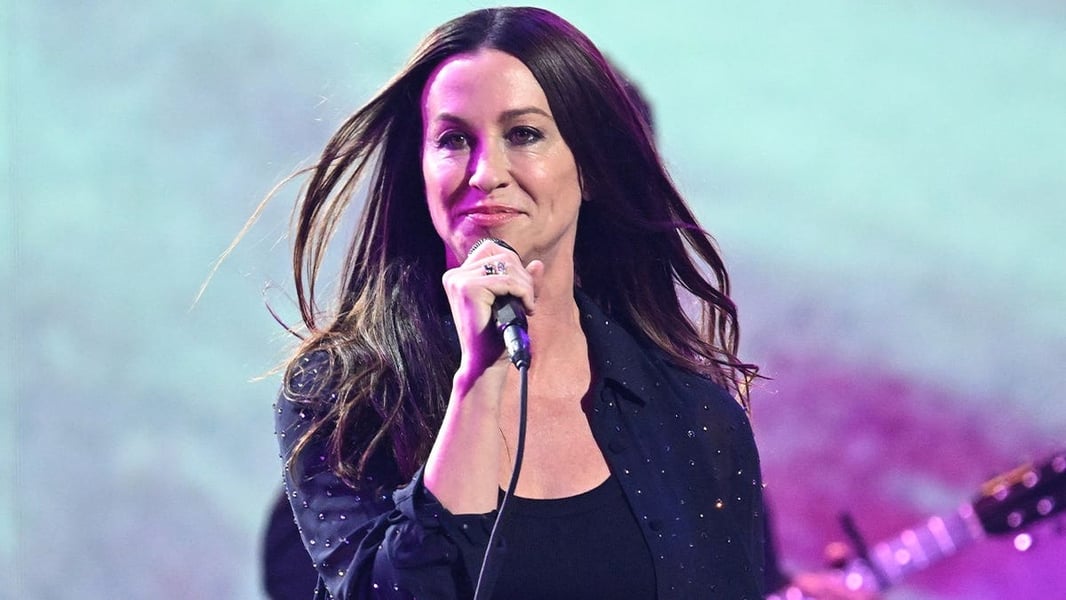 Alanis Morissette at a public appearance in 2026, pictured amid her lawsuit against former tour manager Keren Urinov
