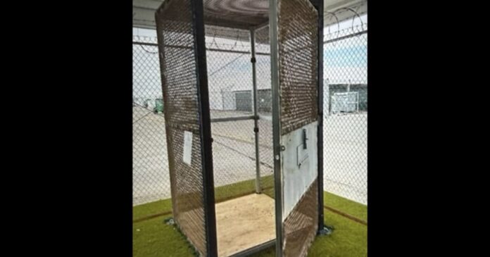 Metal cage enclosure at Alligator Alcatraz Florida immigration detention center