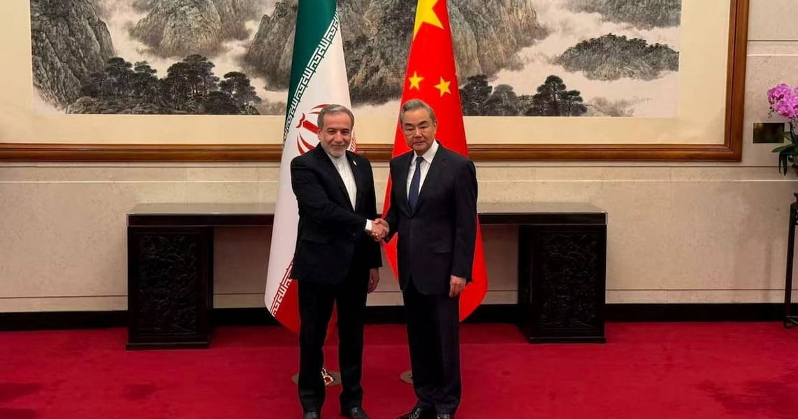 Iranian Foreign Minister Abbas Araghchi and Chinese FM Wang Yi at Beijing talks on Strait of Hormuz reopening