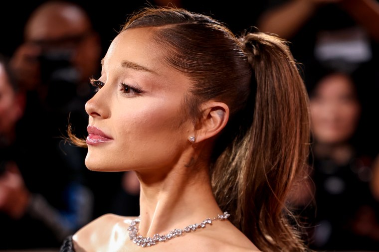 Ariana Grande in black on stage at O2 Arena London during Eternal Sunshine Tour finale