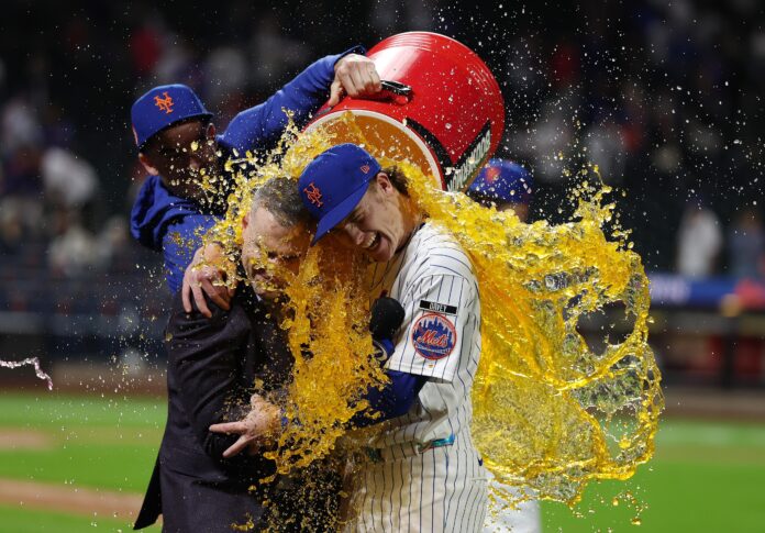 Carson Benge reacts after breaking the Mets rookie hits record with his 156th hit of the season at Citi Field