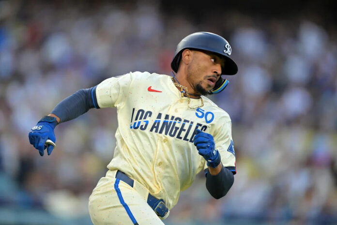 Mookie Betts doubles for the Los Angeles Dodgers against the San Francisco Giants