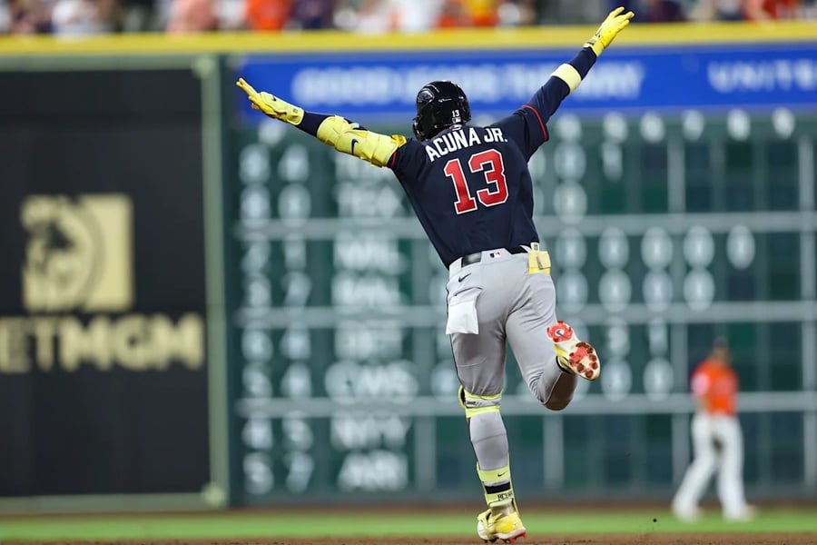 Atlanta Braves players celebrate clinching their 2026 MLB postseason berth at Truist Park