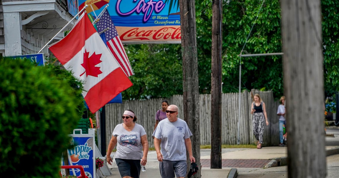 Canadian flag tourism boycott United States Trump tariffs 2026