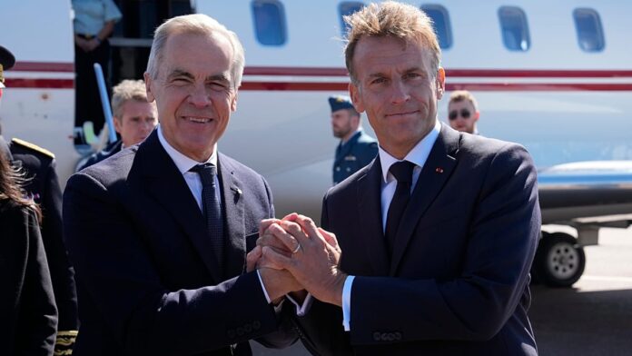 Canadian Prime Minister Mark Carney and French President Emmanuel Macron at Saint-Pierre-et-Miquelon summit