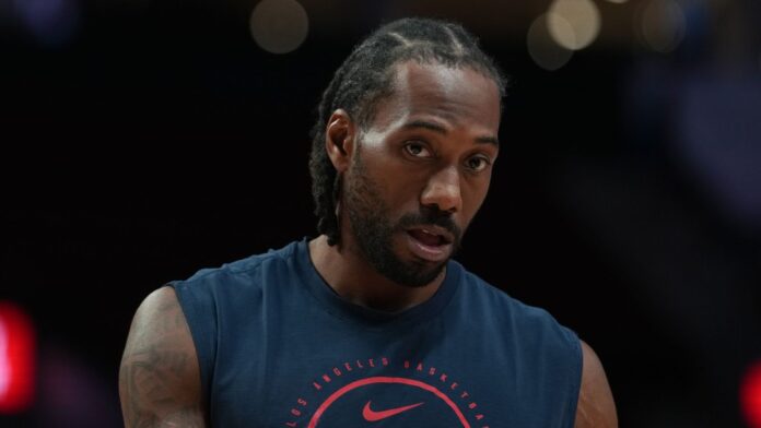 Los Angeles Clippers owner Steve Ballmer and Kawhi Leonard after NBA salary cap circumvention ruling