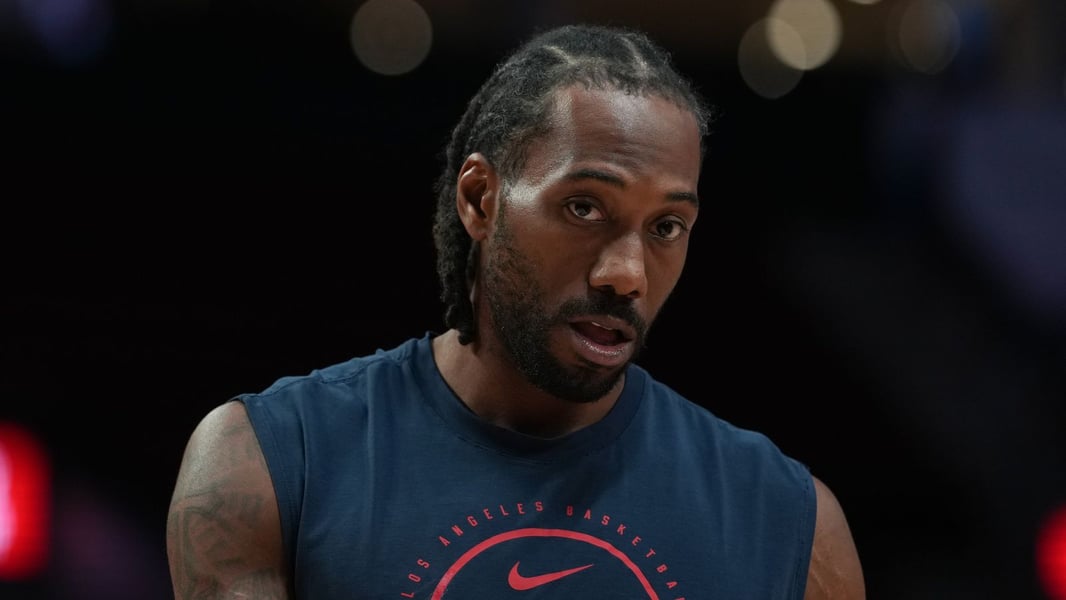 Los Angeles Clippers owner Steve Ballmer and Kawhi Leonard after NBA salary cap circumvention ruling