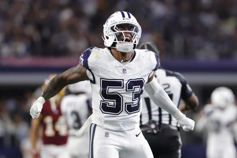 Dak Prescott celebrates his 249th Cowboys touchdown pass, breaking Tony Romo's franchise record against the Washington Commanders