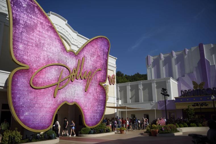 Dolly Parton performing, her country music legacy spanning six decades