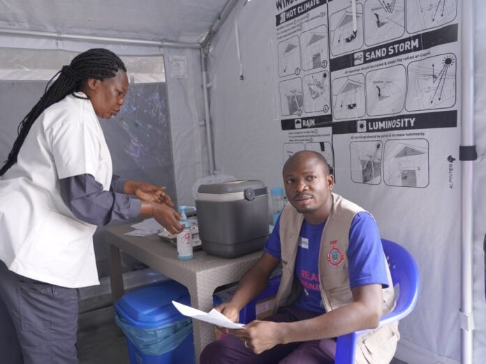 A health worker in protective gear at an Ebola treatment centre in eastern Democratic Republic of Congo