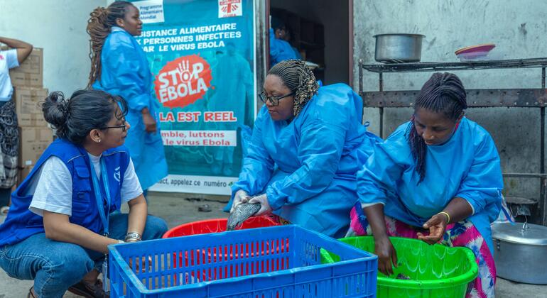 WFP workers distribute food aid to communities affected by the Ebola outbreak in DRC, June 2026