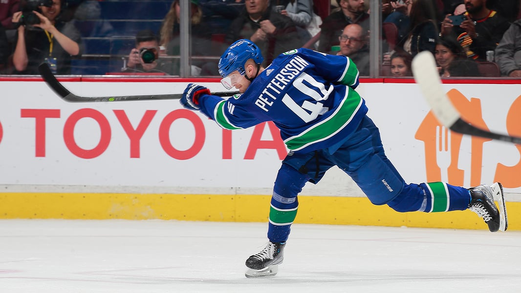 Elias Pettersson skating for the Vancouver Canucks