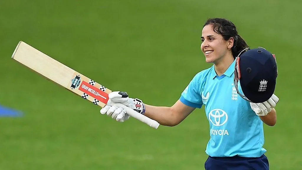 England Women players celebrate after completing their record ODI run chase of 282 against Ireland at Grace Road