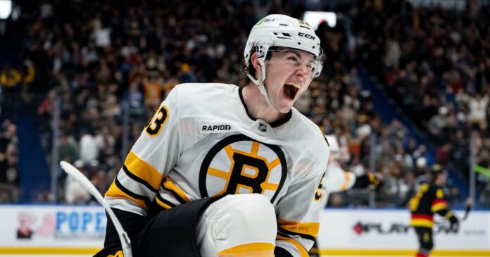 Fraser Minten in Boston Bruins uniform after signing seven-year contract extension