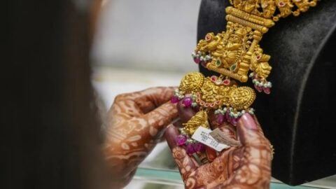 Gold coins and jewellery displayed in Indian market ahead of Navratri festival with record gold prices September 2026