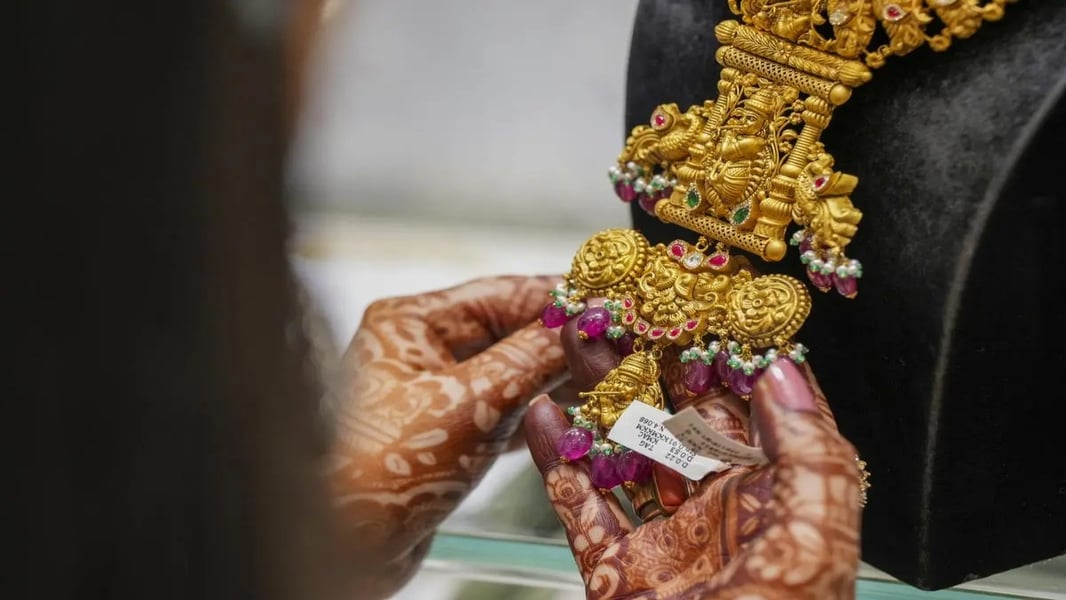 Gold coins and jewellery displayed in Indian market ahead of Navratri festival with record gold prices September 2026