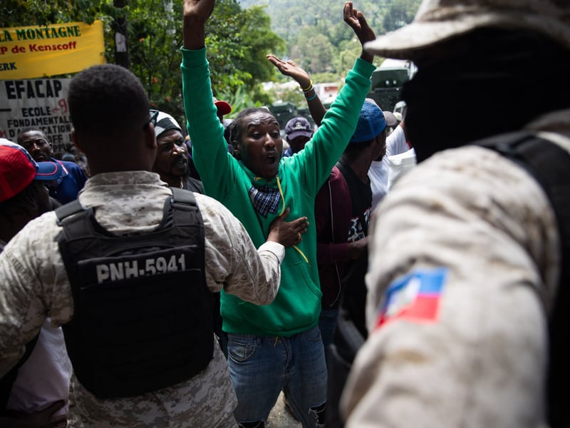 Aftermath of a gang raid in Haiti that killed dozens and led to mass kidnappings