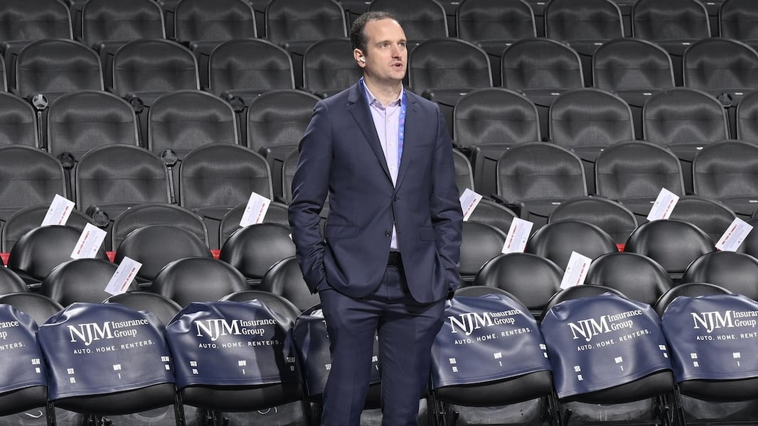 Atlanta Hawks front office executives Tim Bontemps and Peter Dinwiddie with team president Onsi Saleh