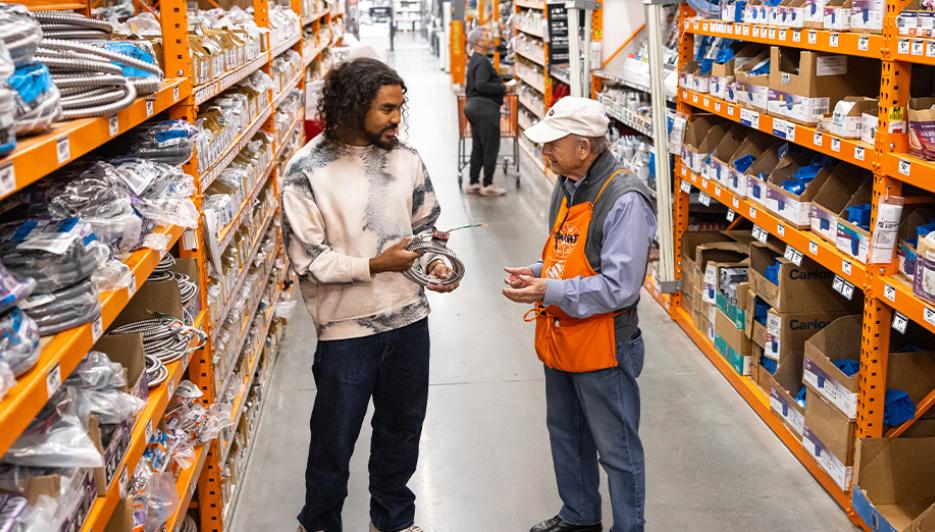 Home Depot store exterior — HD stock fell 0.39% to $318.51 on September 3 2026 after Q2 2026 earnings beat