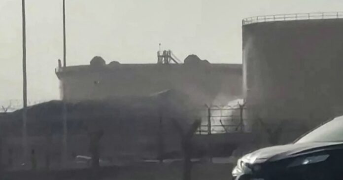 Black smoke rising from Aramco fuel depot near King Khalid International Airport in Riyadh after Houthi missile and drone attack on September 19 2026