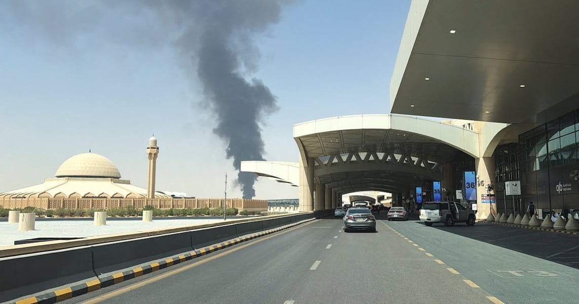 Smoke rises after Houthi missile strike on King Khalid International Airport in Riyadh, Saudi Arabia
