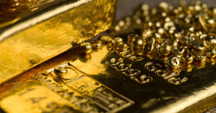 Gold jewellery and bars representing India's gold demand in Q1 2026 as prices rise ahead of Federal Reserve decision