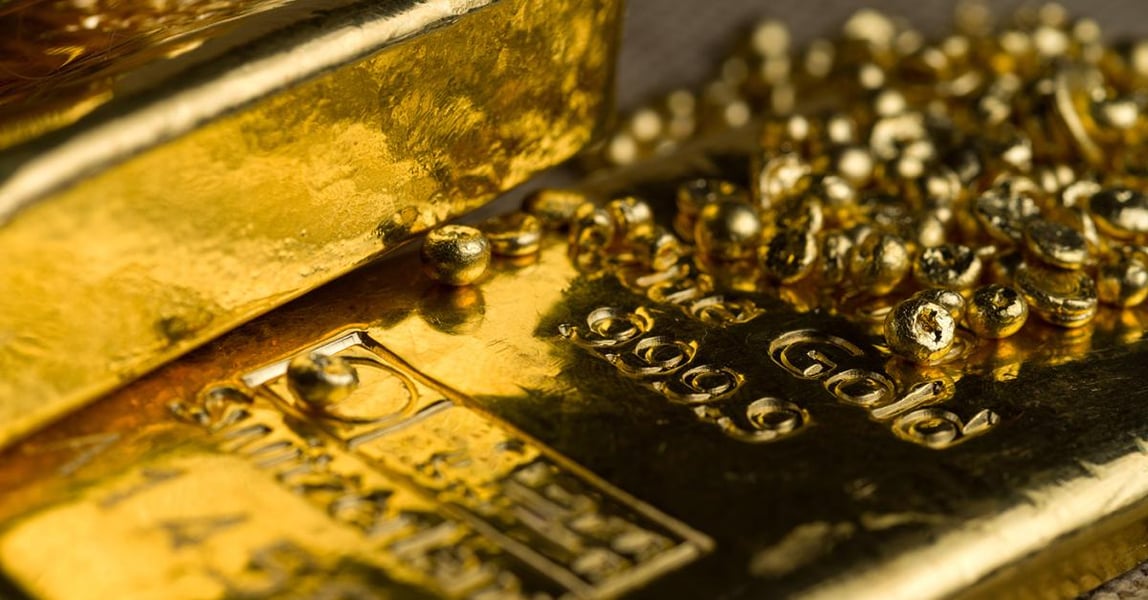 Gold jewellery and bars representing India's gold demand in Q1 2026 as prices rise ahead of Federal Reserve decision