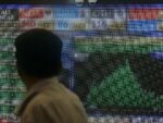 Traders monitor screens at the Bombay Stock Exchange as Nifty falls amid Brent crude surge September 2026