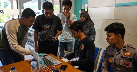 Overturned hull of Indonesia's Virgo Transport 8 ferry in the Java Sea after capsizing with 243 people aboard