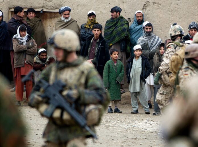 US troops in Afghanistan after 9/11, a conflict that inadvertently boosted Iran's regional influence