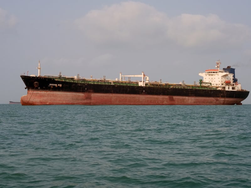 Omani mediators and Iranian officials during Hormuz shipping route negotiations August 2026 that led to the Salalah agreement