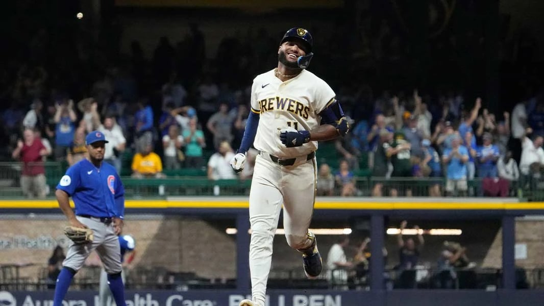 Jackson Chourio celebrates after hitting a two-run home run for the Milwaukee Brewers