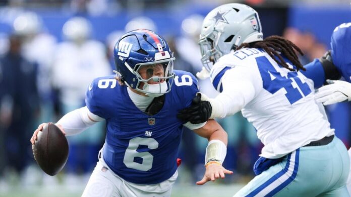 Jaxson Dart drops back to pass for the New York Giants against the Dallas Cowboys in NFL Week 1 Sunday Night Football