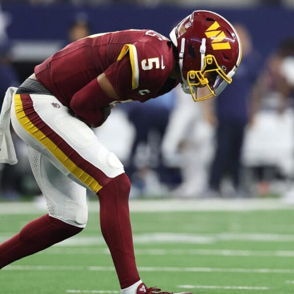 Jayden Daniels is carted off the field with a dislocated left elbow against the Dallas Cowboys in Week 2 2026