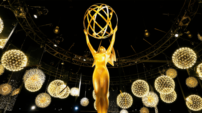 Jon Hamm and Anna Osceola on the Emmy Awards red carpet 2026 at Peacock Theater