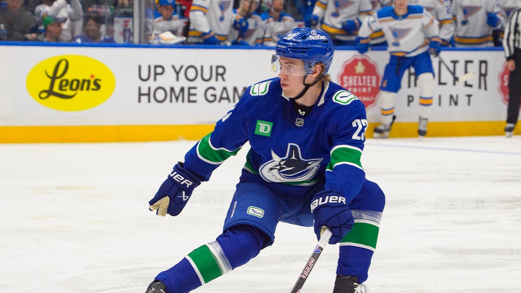 Jonathan Lekkerimäki skating for the Vancouver Canucks